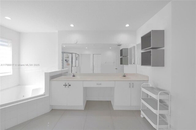 6694 NW 107th Pl, Doral, FL 33178 - full bathroom featuring a tub with jets, a stall shower, double vanity, tile patterned flooring, and recessed lighting