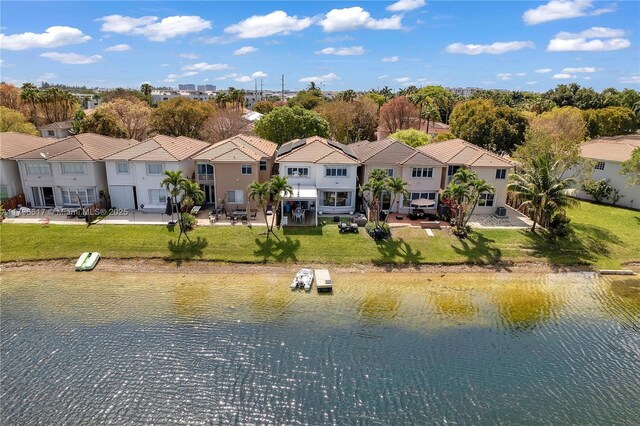 6694 NW 107th Pl, Doral, FL 33178 - aerial view of residential area with a nearby body of water