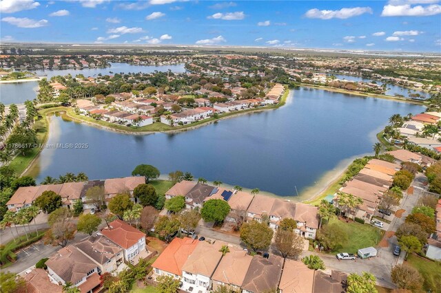 6694 NW 107th Pl, Doral, FL 33178 - aerial overview of property's location featuring nearby suburban area and a large body of water
