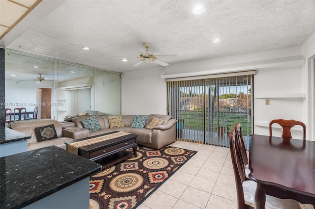 3111 Coral Springs Dr Unit 211, Coral Springs, FL 33065 - living room featuring ceiling fan, light tile patterned floors, a textured ceiling, and recessed lighting