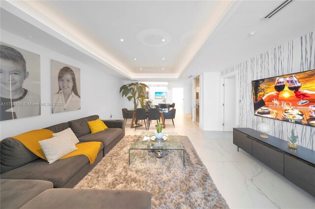 10700 NW 66th St Unit 103, Doral, FL 33178 - living area featuring marble finish floors, a raised ceiling, and recessed lighting
