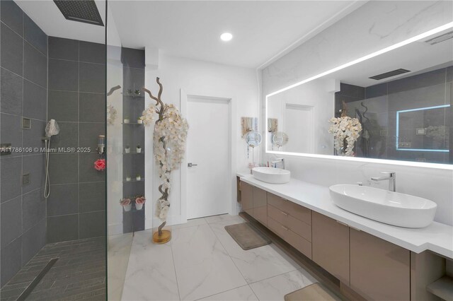 10700 NW 66th St Unit 103, Doral, FL 33178 - bathroom featuring double vanity, a walk in shower, and marble look tile flooring