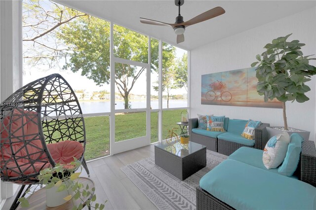 10700 NW 66th St Unit 103, Doral, FL 33178 - sunroom / solarium featuring a ceiling fan, an outdoor hangout area, and a water view