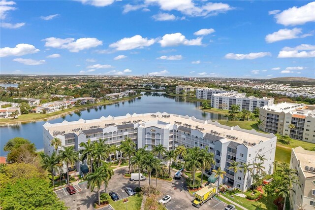 10700 NW 66th St Unit 103, Doral, FL 33178 - drone / aerial view of apartment complex / building and a nearby body of water