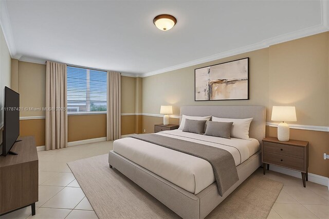 1455 N Treasure Dr Unit 7F, North Bay Village, FL 33141 - bedroom featuring light tile patterned floors and crown molding