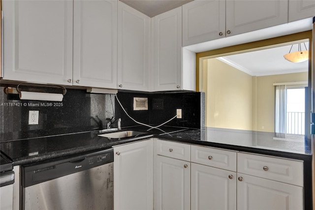 kitchen featuring white cabinets, stainless steel dishwasher, and a sink