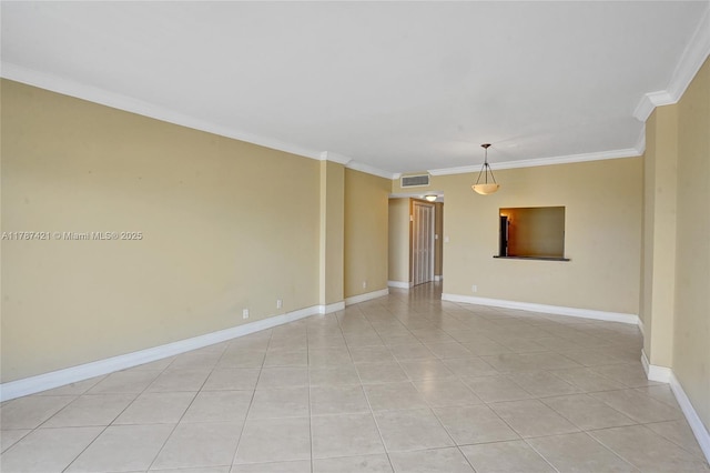 spare room featuring visible vents, crown molding, baseboards, and light tile patterned floors