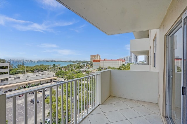 balcony with a city view and a water view