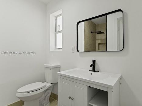 1310 NW 41st St, Oakland Park, FL 33309 - bathroom featuring vanity and toilet