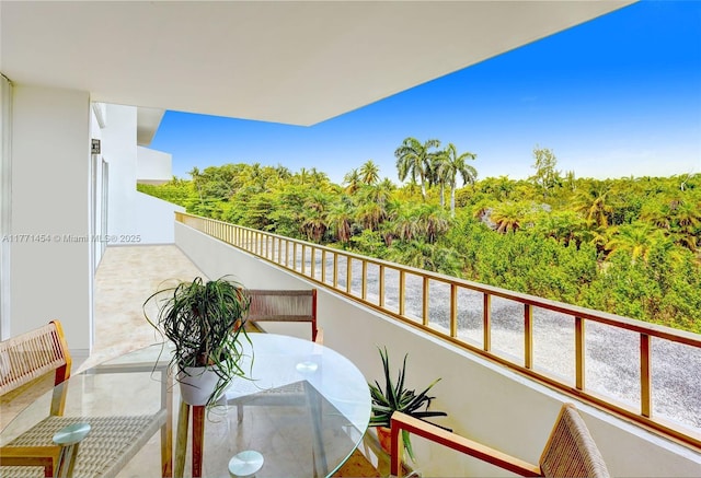 balcony with outdoor dining area