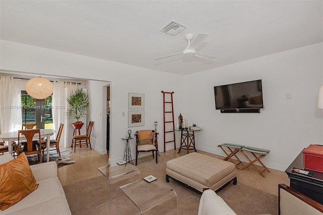430 NE 132nd Ter, North Miami, FL 33161 - living room featuring baseboards, visible vents, and ceiling fan