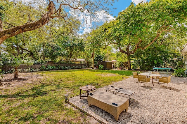 430 NE 132nd Ter, North Miami, FL 33161 - view of yard with a fenced backyard and an outdoor structure