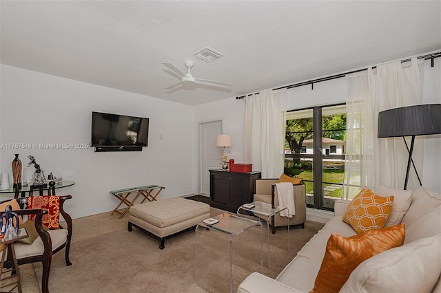 430 NE 132nd Ter, North Miami, FL 33161 - living room featuring visible vents, baseboards, and ceiling fan
