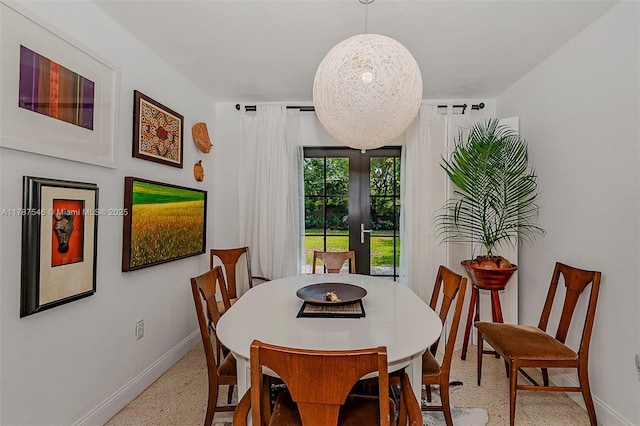 430 NE 132nd Ter, North Miami, FL 33161 - dining room with speckled floor and baseboards