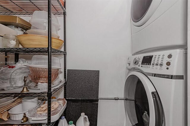 430 NE 132nd Ter, North Miami, FL 33161 - washroom featuring stacked washing maching and dryer and laundry area
