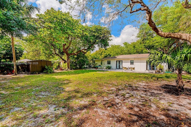 430 NE 132nd Ter, North Miami, FL 33161 - view of yard with fence and a patio