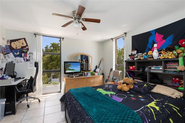 2801 SW 87th Ave Unit 1006, Davie, FL 33328 - bedroom with tile patterned floors, a desk, and ceiling fan