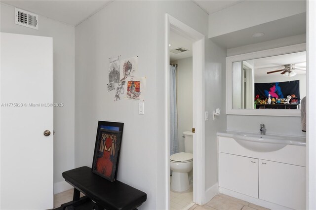 2801 SW 87th Ave Unit 1006, Davie, FL 33328 - full bath with vanity, toilet, ceiling fan, tile patterned floors, and baseboards