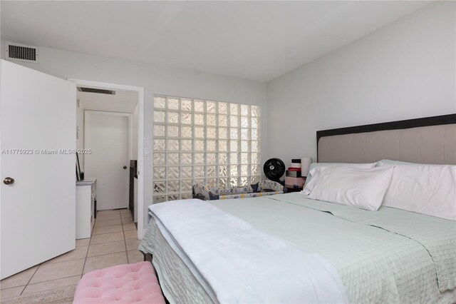 2801 SW 87th Ave Unit 1006, Davie, FL 33328 - bedroom with multiple windows, floor to ceiling windows, access to outside, and light tile patterned floors