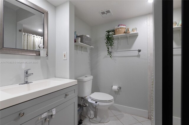 2801 SW 87th Ave Unit 1006, Davie, FL 33328 - bathroom with tile patterned floors, vanity, toilet, and baseboards