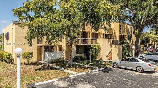 2801 SW 87th Ave Unit 1006, Davie, FL 33328 - view of property featuring uncovered parking