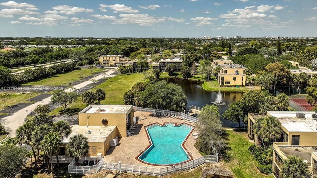 2801 SW 87th Ave Unit 1006, Davie, FL 33328 - bird's eye view of a nearby body of water, a pool area, and a tree filled landscape