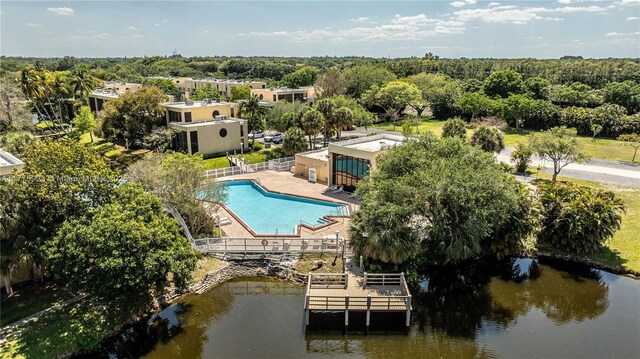 2801 SW 87th Ave Unit 1006, Davie, FL 33328 - aerial view of a pool and a nearby body of water