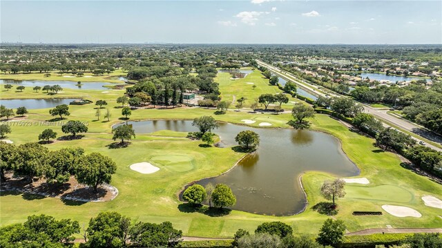 2801 SW 87th Ave Unit 1006, Davie, FL 33328 - bird's eye view of a local golf course, a nearby body of water, and a tree filled landscape