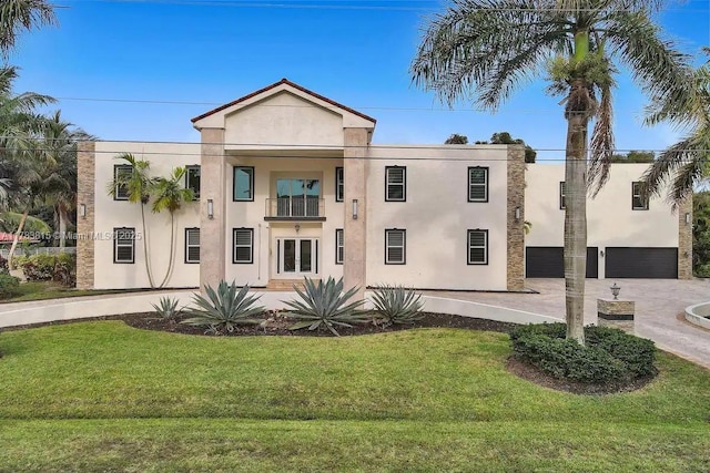 1430 NW 114th Ave, Plantation, FL 33323 - view of property with driveway and an attached garage