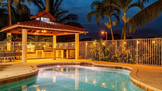 1430 NW 114th Ave, Plantation, FL 33323 - pool at night with a gazebo and a hot tub