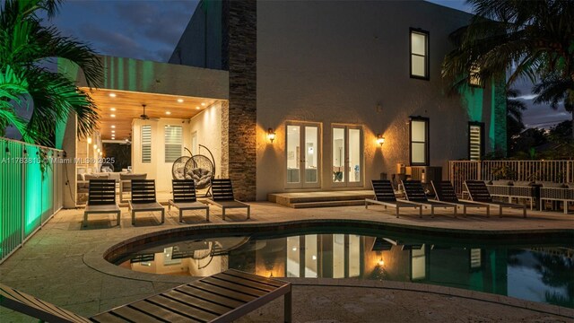 1430 NW 114th Ave, Plantation, FL 33323 - view of pool featuring french doors, a patio area, and an outdoor living space
