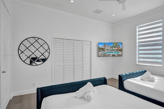 1430 NW 114th Ave, Plantation, FL 33323 - bedroom featuring baseboards, wood finished floors, a closet, ornamental molding, and recessed lighting