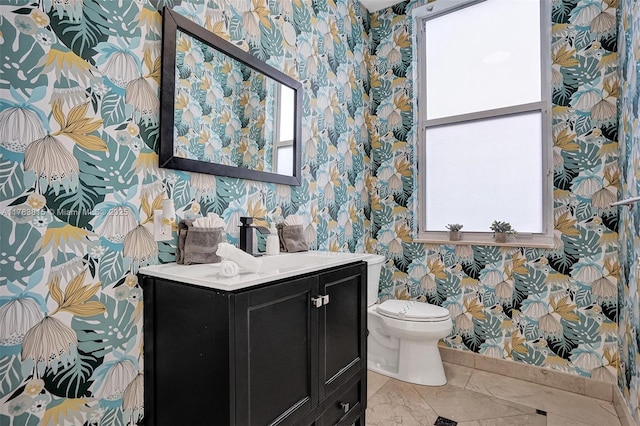 1430 NW 114th Ave, Plantation, FL 33323 - bathroom with wallpapered walls, toilet, and vanity