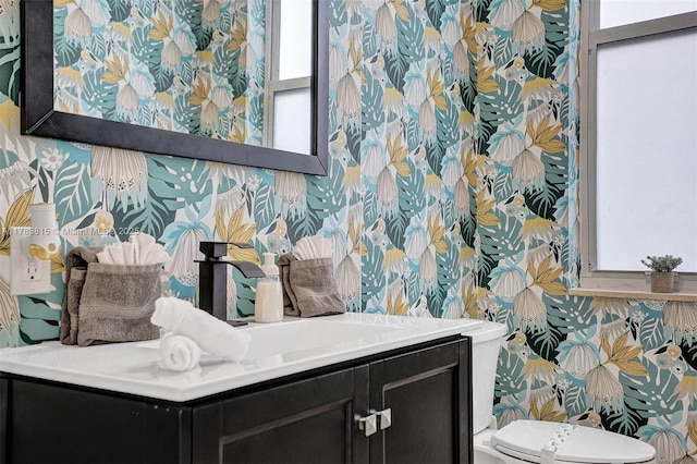 1430 NW 114th Ave, Plantation, FL 33323 - bathroom with toilet, vanity, and wallpapered walls