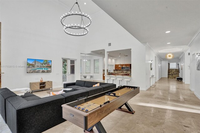 1430 NW 114th Ave, Plantation, FL 33323 - living room with a chandelier, baseboards, recessed lighting, concrete flooring, and ornamental molding