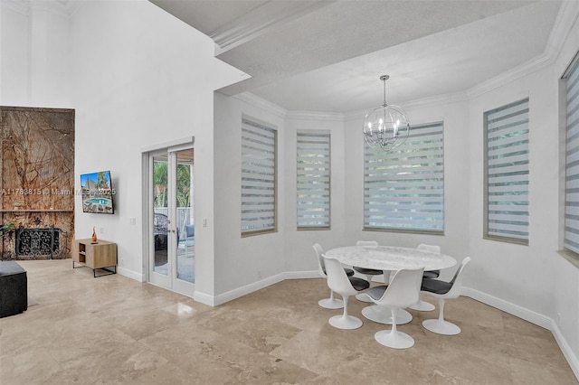1430 NW 114th Ave, Plantation, FL 33323 - unfurnished dining area featuring ornamental molding, a chandelier, baseboards, and a fireplace
