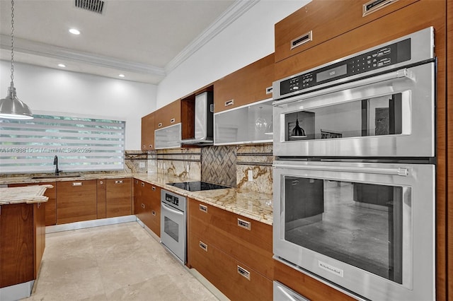 1430 NW 114th Ave, Plantation, FL 33323 - kitchen featuring a sink, ornamental molding, wall chimney range hood, double oven, and brown cabinets
