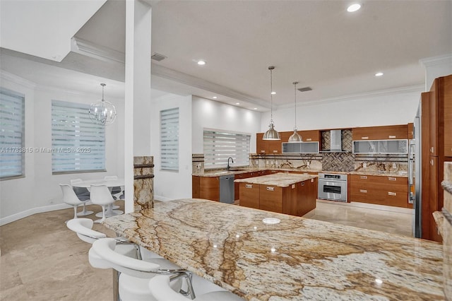 1430 NW 114th Ave, Plantation, FL 33323 - kitchen featuring brown cabinets, a sink, ornamental molding, stainless steel appliances, and decorative backsplash