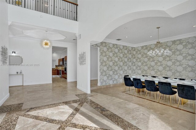 1430 NW 114th Ave, Plantation, FL 33323 - building lobby featuring wallpapered walls, ornamental molding, and recessed lighting