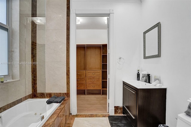 1430 NW 114th Ave, Plantation, FL 33323 - full bathroom featuring a jetted tub, vanity, and a walk in closet