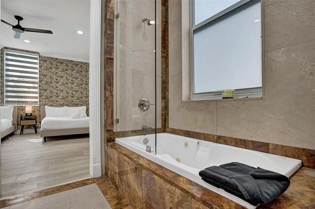 1430 NW 114th Ave, Plantation, FL 33323 - ensuite bathroom featuring a relaxing tiled tub, a ceiling fan, tiled shower, marble finish flooring, and tile walls
