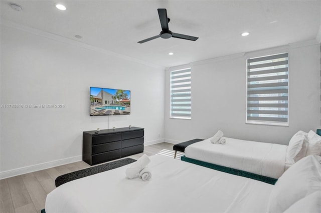 1430 NW 114th Ave, Plantation, FL 33323 - bedroom with wood finished floors, baseboards, crown molding, recessed lighting, and ceiling fan