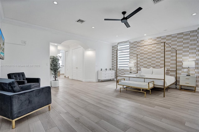 1430 NW 114th Ave, Plantation, FL 33323 - bedroom with arched walkways, ornamental molding, wood finished floors, an accent wall, and baseboards