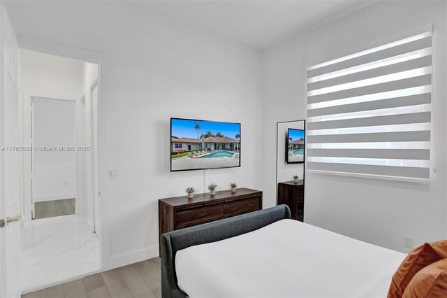3152 SW 147th Ave, Davie, FL 33330 - bedroom featuring wood finished floors and baseboards