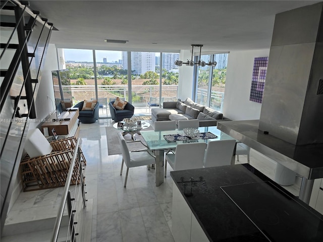 2950 NE 188th St Unit 501, Aventura, FL 33180 - dining room with expansive windows and a chandelier