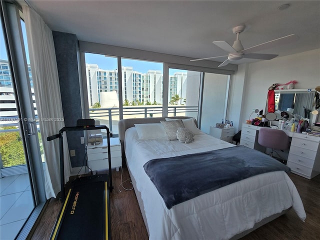 2950 NE 188th St Unit 501, Aventura, FL 33180 - bedroom with wood finished floors and ceiling fan