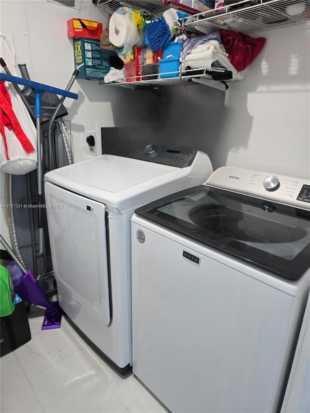 2950 NE 188th St Unit 501, Aventura, FL 33180 - washroom with washing machine and clothes dryer
