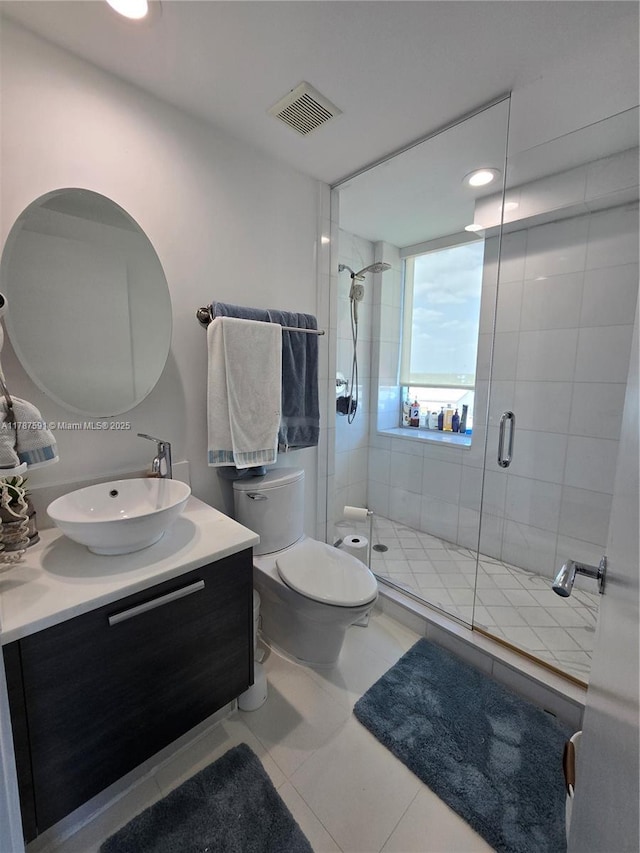 2950 NE 188th St Unit 501, Aventura, FL 33180 - full bath with vanity, a stall shower, toilet, tile patterned flooring, and recessed lighting