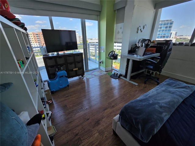 2950 NE 188th St Unit 501, Aventura, FL 33180 - bedroom featuring access to outside, wood finished floors, and baseboards