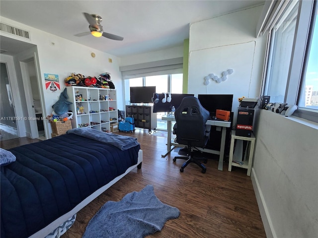 2950 NE 188th St Unit 501, Aventura, FL 33180 - bedroom with multiple windows, an office area, wood finished floors, and ceiling fan